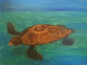 Brown turtle on blue-green background with blue area for sky.
