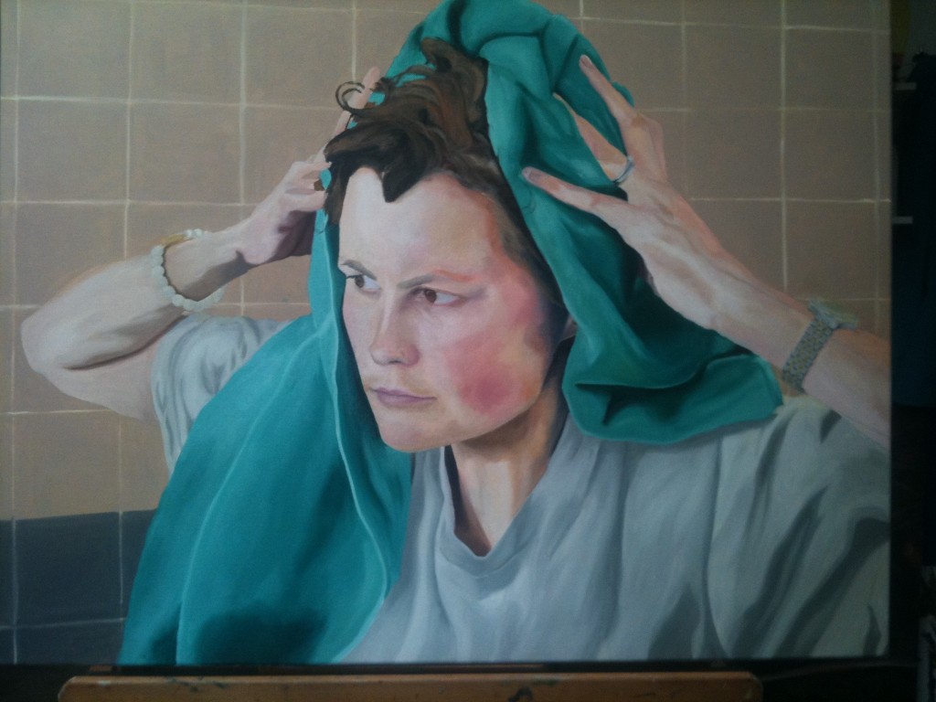 self-portrait. Artist is in a white-grey T-shirt and rubbing hair dry with a green towel, facing to left of canvas.