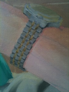 Close-up of watch with bimetallic strap.