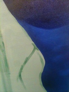 Close up of half-painted area of canvas in blue shades