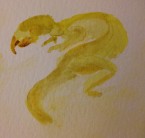 A curled, wingless yellow dragon, with a few shades of brown.