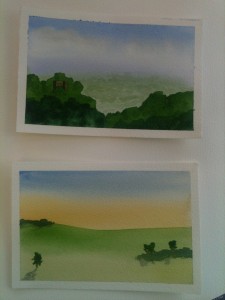 Two postcards of landscapes against the sky, showing softly mixed tones