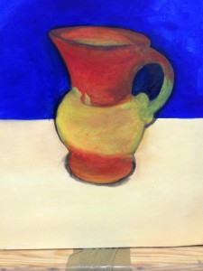 yellow and bright red jug, in close-up