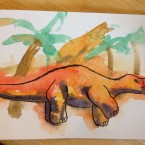Orange and red and blue watercolour disnosaur, outlined in black ink