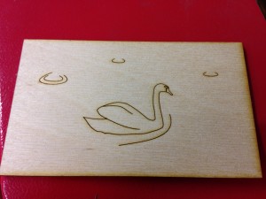 lasercut line drawing of a swan